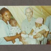 Sister Carmel holding an Ogoni baby.